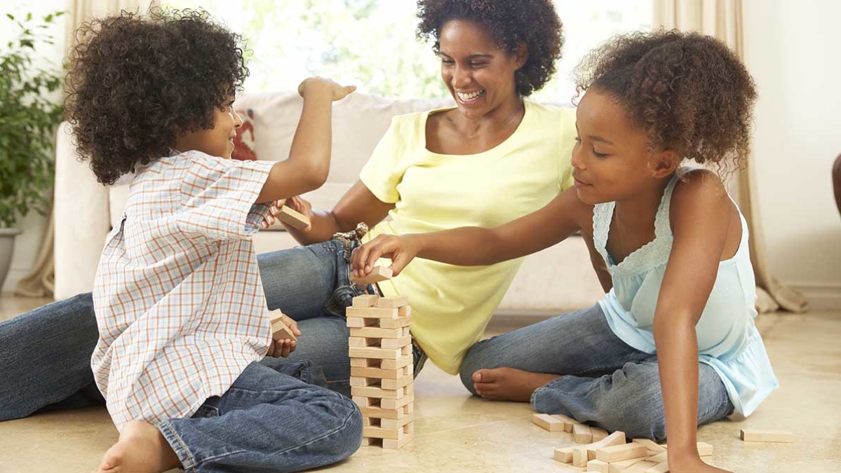 Family playing together in lounge