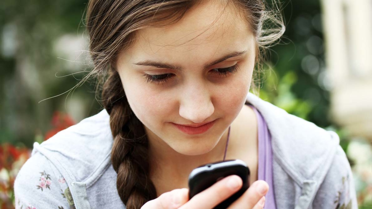 Teenage girl using mobile