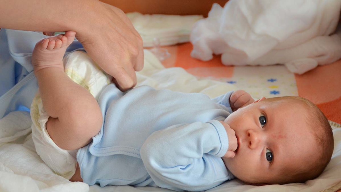 Baby on changing mat