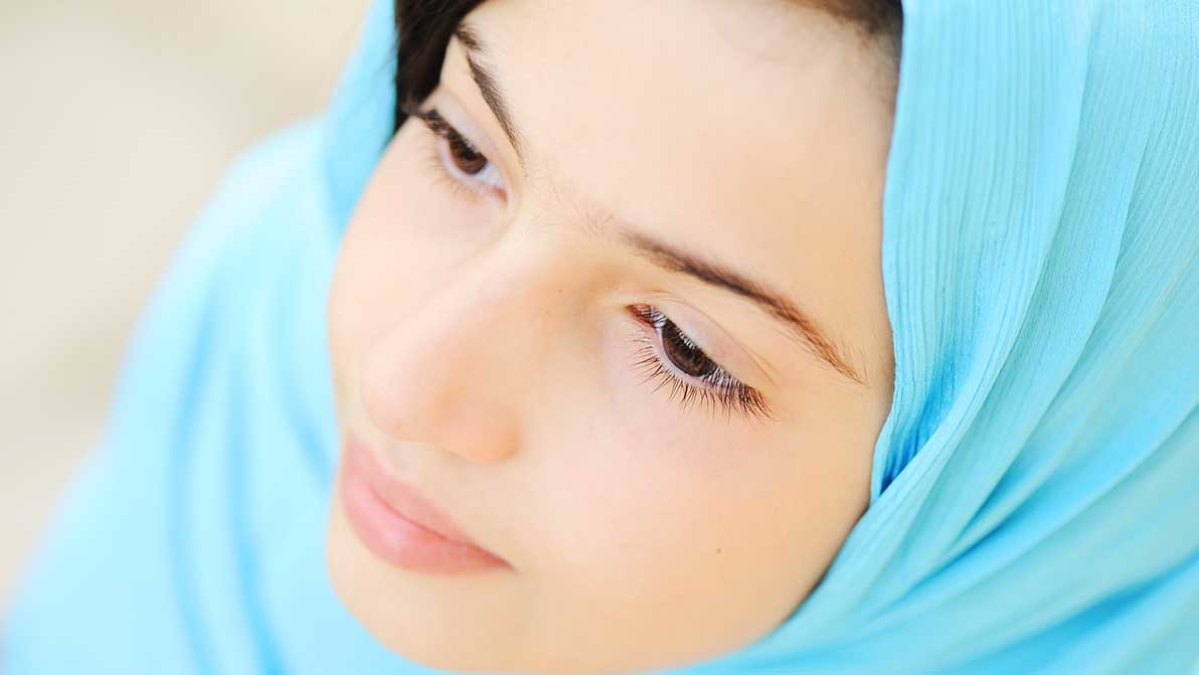 Woman wearing blue headscarf