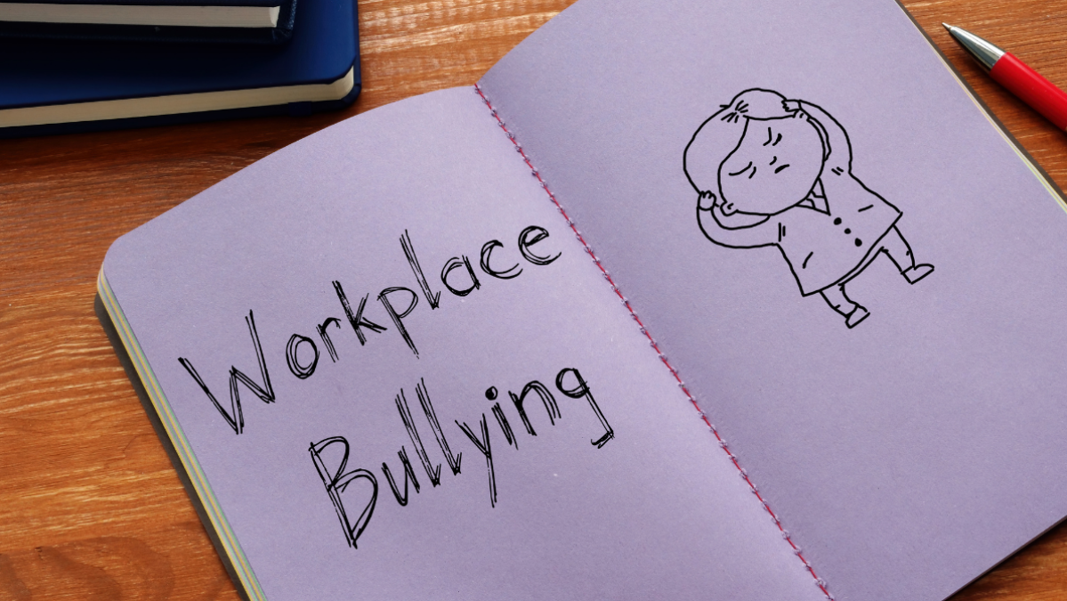 Workplace bullying book and scribble
