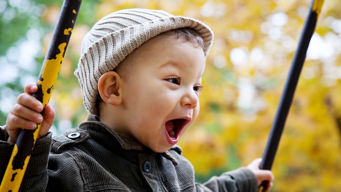 Toddler on swing